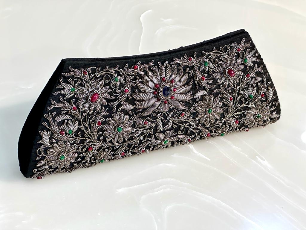 BLACK RAW SILK SLENDER STYLE CLUTCH WITH ZARI EMBROIDERY AND PRECIOUS STONES